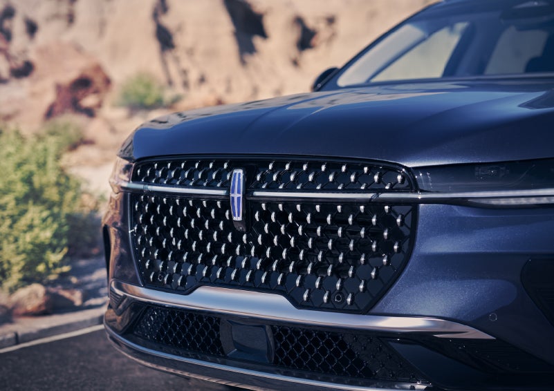 The stylish grille of a 2024 Lincoln Nautilus® SUV sparkles in the sunlight. | Cavalier Lincoln in Chesapeake VA